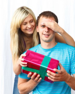 girl-giving-guy-gift Girl Gives Guy Gift