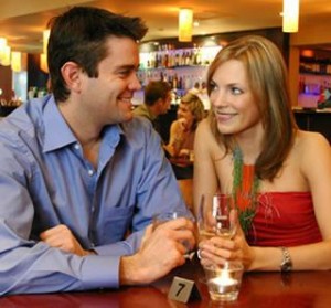 Guy & girl getting drinks