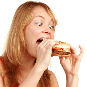 woman eating burger